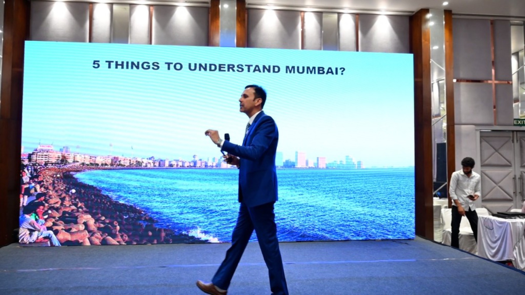 Bhupendra Singh Shekhawat walking the aisle while speaking