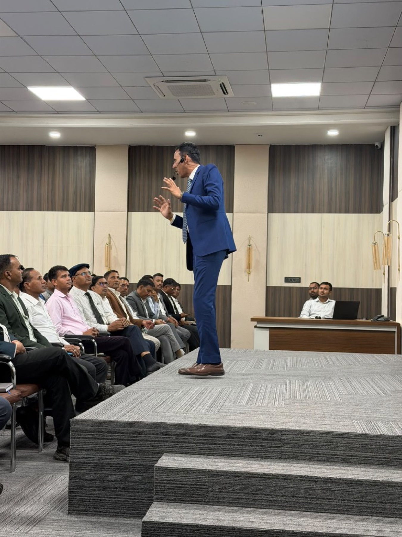 Bhupendra Singh Shekhawat gesturing while teaching